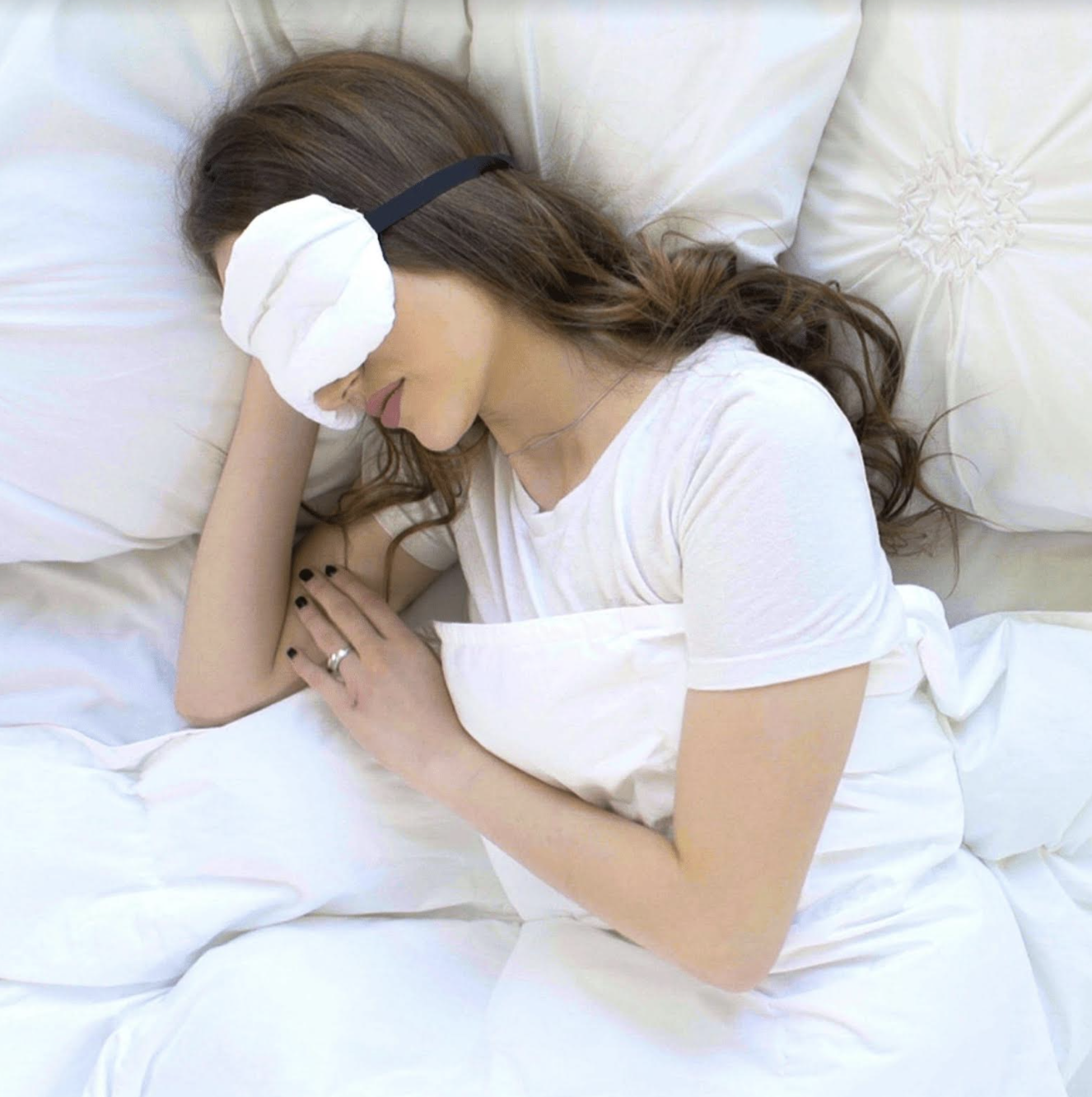 Woman Sleeping And Wearing Padded Sleep Mask