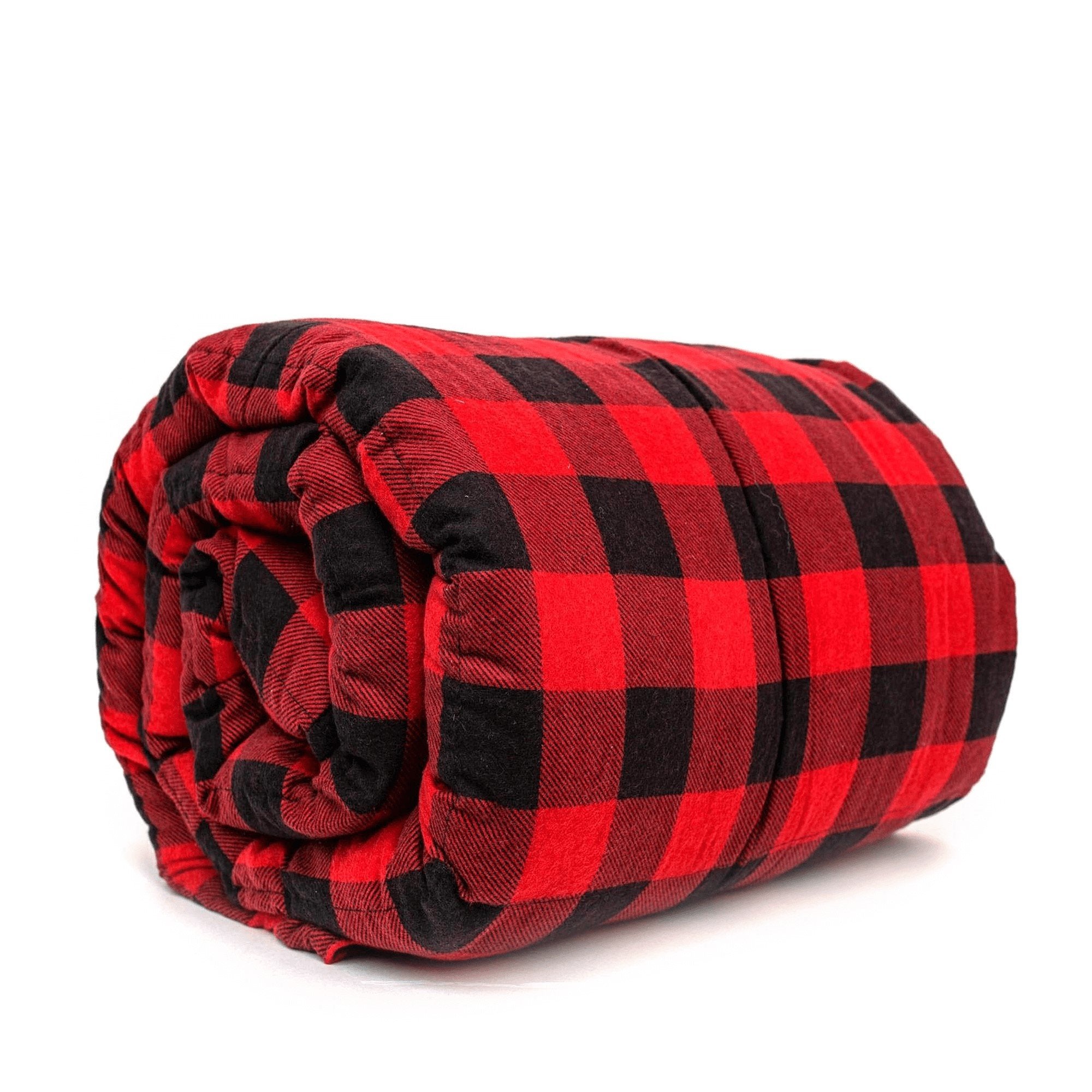 Man watches TV snuggled under a Mosaic Weighted Blankets Big Red Flannel Weighted Blanket